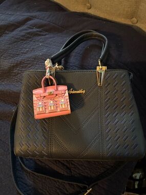 Navy bag with charms